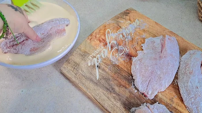 Heat oil in a frying pan. Fry the battered tilapia fillets for about 2-3 minutes per side, or until golden brown and crispy. Flip occasionally to ensure even cooking.