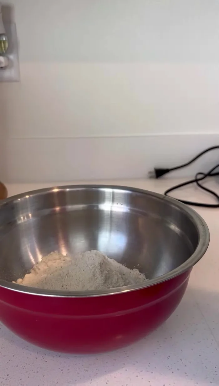 Prepare the sope dough by gradually adding warm water to masa harina until the desired consistency is achieved. Knead well.