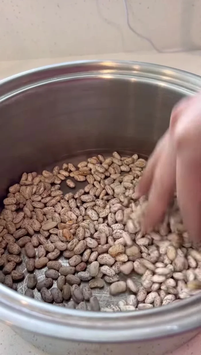 Clean and cook the beans.