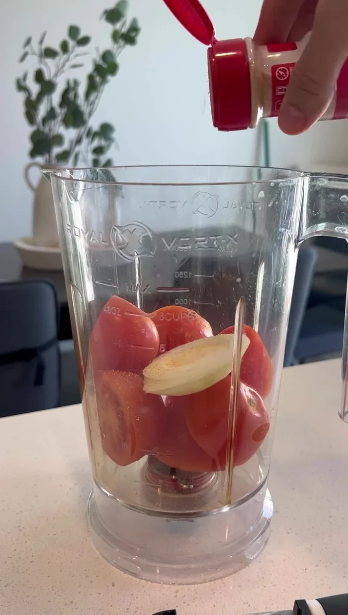 Blend tomatoes, a small piece of onion, and garlic powder with a little water.