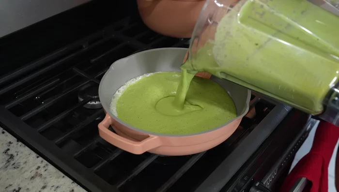 In a pan, melt butter and add poblano sauce. Simmer and adjust seasoning.