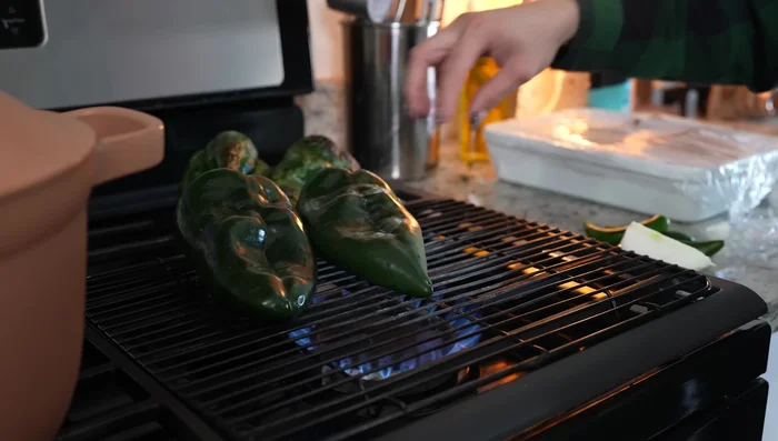 Roast 7 poblano peppers, 4 serrano peppers, and a quarter of a white onion.