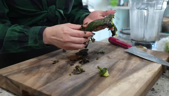 Blend 4 poblano peppers. Cut the remaining 3 into strips.