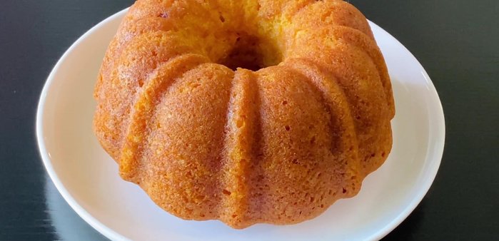 For the frosting: In a bowl, combine cream cheese, mango puree, and green cardamom or vanilla essence. Mix well. Add sugar if needed.