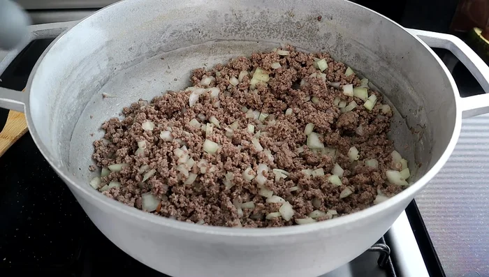 Add minced garlic and cook for a minute.