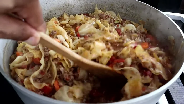 Continue to simmer for another 15-20 minutes, or until the carrots and cabbage are tender.