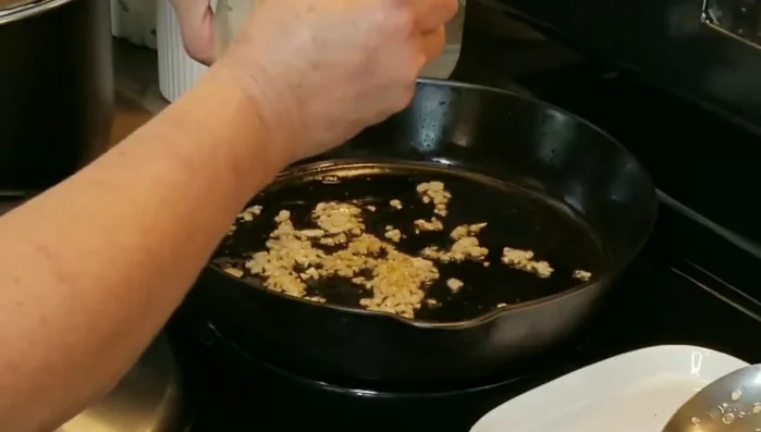 Add 1 large garlic clove and cook for 1 minute.
