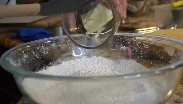 Add butter and milk to the powdered sugar; whisk until smooth.