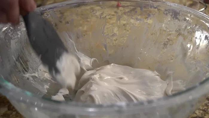 Stir in Mexican vanilla and pink food coloring.
