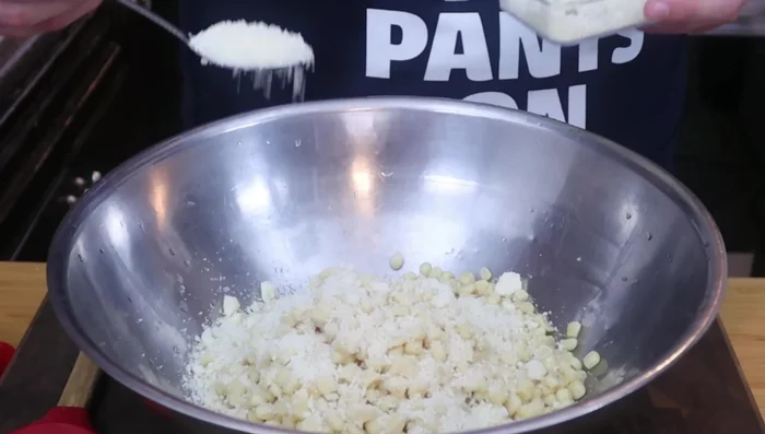 Add Cotija cheese, gradually, being mindful of saltiness.