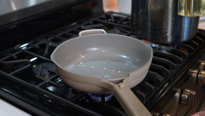 Heat oil in a pan over medium heat. Add the blended chili sauce, strain if needed, and bring to a simmer. Allow flavors to meld.