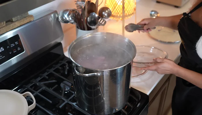 Once boiling again, remove foam from the surface.
