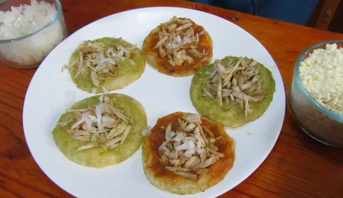 Add final touches: Garnish with chopped onion and cheese, as desired.