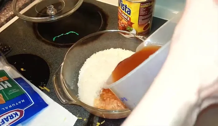 Stir the rice and liquid thoroughly to ensure no rice floats on top.