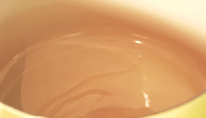 Cook the chili sauce down in vegetable oil to thicken and enhance the flavor.