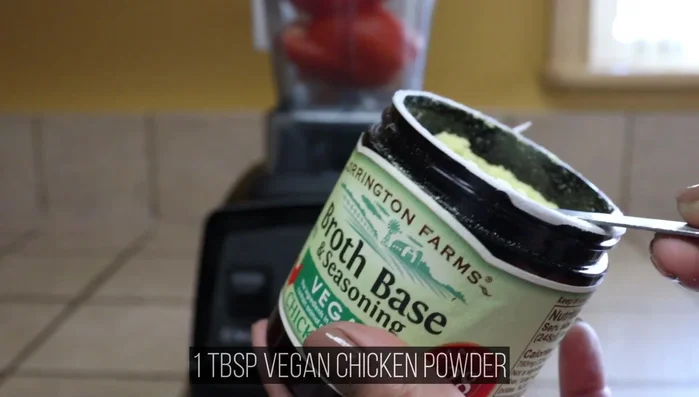 Add vegetable broth, vegan chicken bouillon powder, and water to the blender.