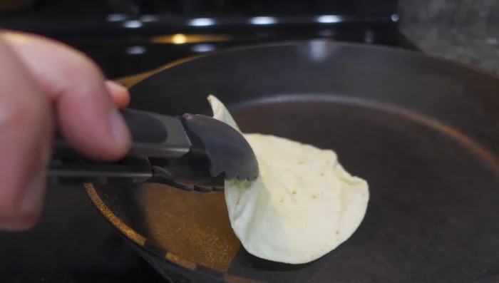 Warm the taco shells.