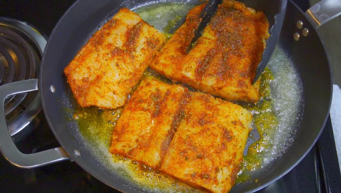 Heat a pan with butter. Add the fish, cover, and cook on low heat for 20-25 minutes.