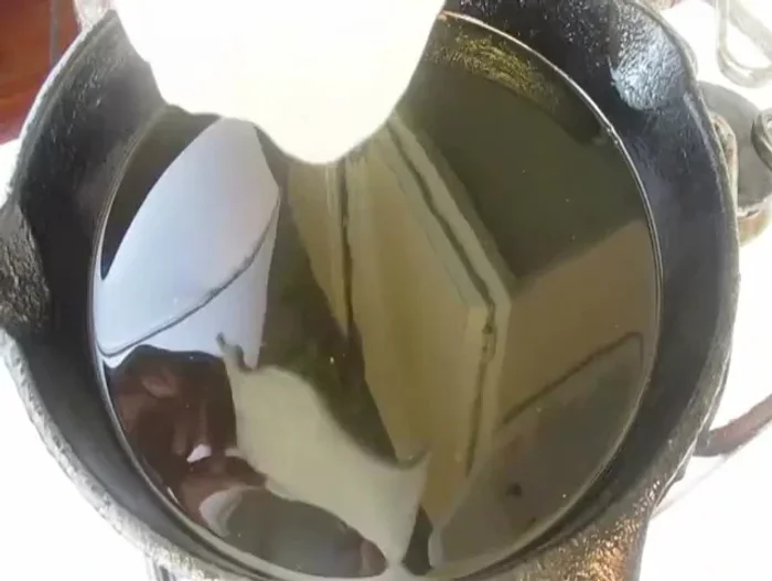 Fry the bread in hot oil until golden brown.