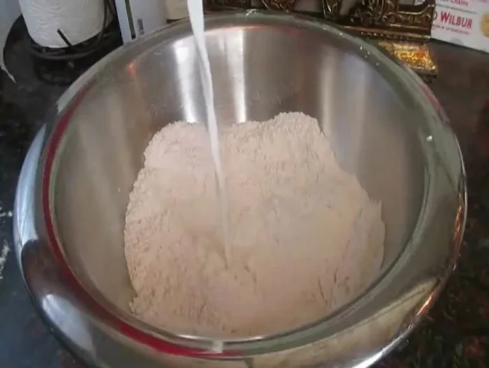 Add milk and mix until a sticky dough forms.