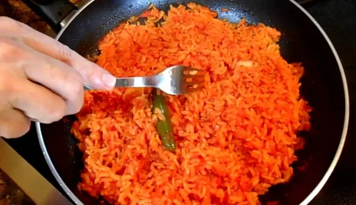 Continue cooking until all the water is absorbed (about 5 more minutes). Turn off the heat and let the rice sit, covered, to allow it to steam and become fluffy.