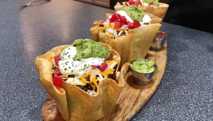 Serve. Add guacamole, sour cream, salsa, and hot sauce as desired.