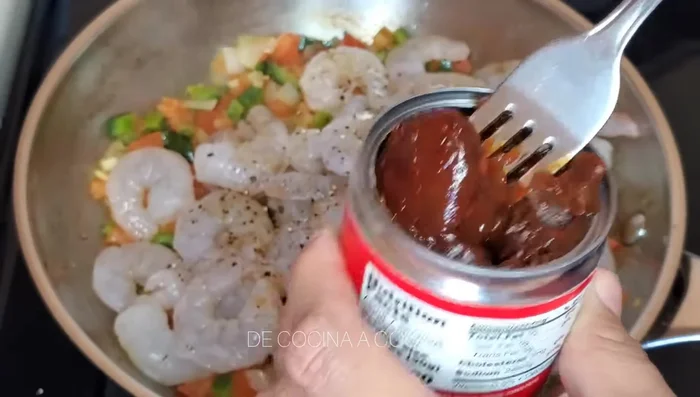 Add chipotle peppers (adjust quantity to your spice preference). Stir and cook briefly.