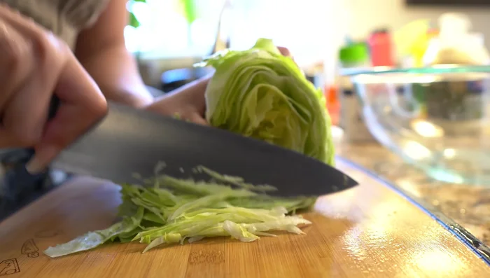 Shred lettuce and rinse.