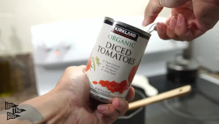 Add one 14-ounce can of diced tomatoes. Simmer on low heat for 30-40 minutes, or until thickened.