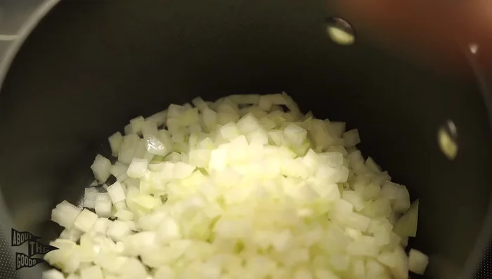 Add oil to a pot and then throw in a medium diced onion. Cook until caramelized and brown (about 2 minutes, or longer for deeper caramelization).