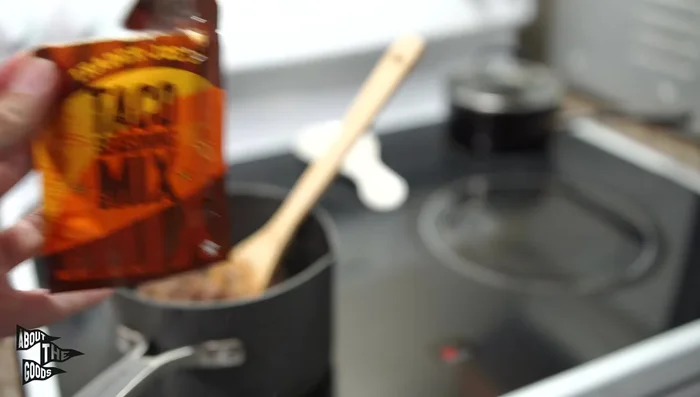 Add the entire packet of Trader Joe's taco seasoning (or half a packet for less spice).
