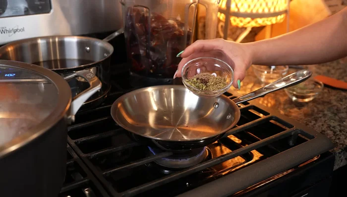 Toast 1 tsp peppercorns, 2 tsp oregano, 2 tsp cumin, 2 tsp thyme, and 5 whole cloves until fragrant. Add to the blender.