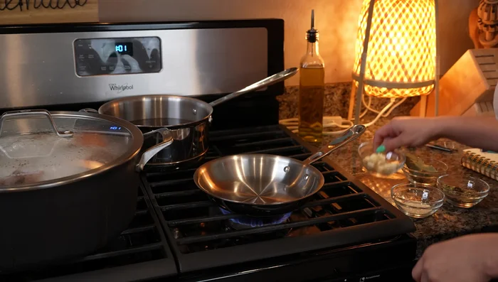 Toast 7 garlic cloves in a small pan over medium heat until fragrant. Reduce heat to low and transfer to the blender.