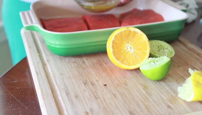 Pour the Citrus brown butter sauce over the salmon fillets.