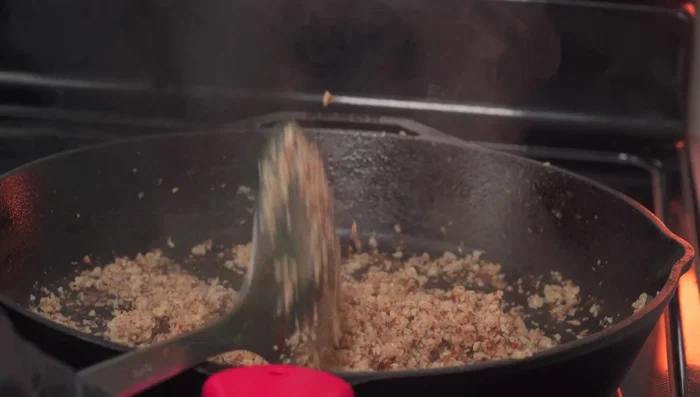 Repeat the pressing and cooking process two more times (total of 15 minutes cooking time).