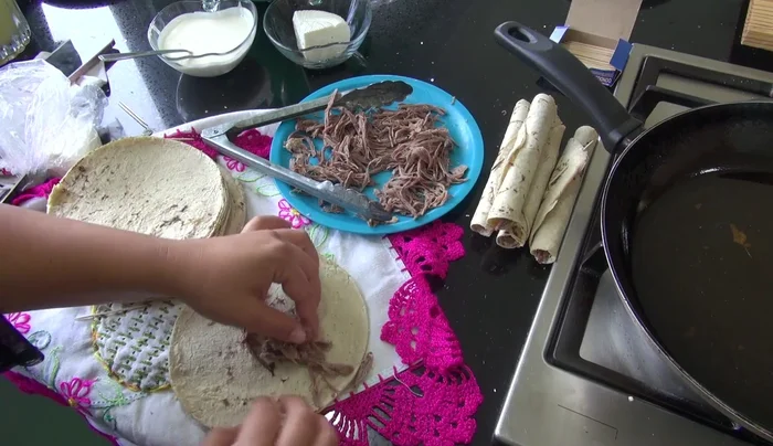If tortillas are too cold or brittle, warm them up briefly in the microwave or griddle before filling.