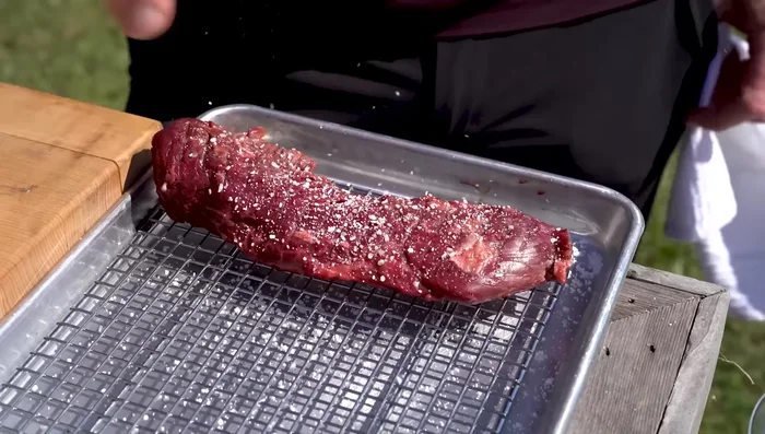 Season the hanger steak generously with salt and coarsely with pepper.