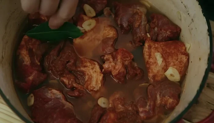 Add bay leaves and cinnamon sticks.