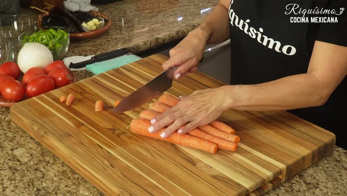Prepare the carrots: trim ends, peel, and cut into small pieces.