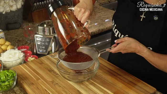 Strain the chili mixture to remove pulp.