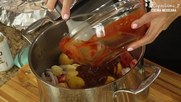 Add the blended chili sauce and beer.