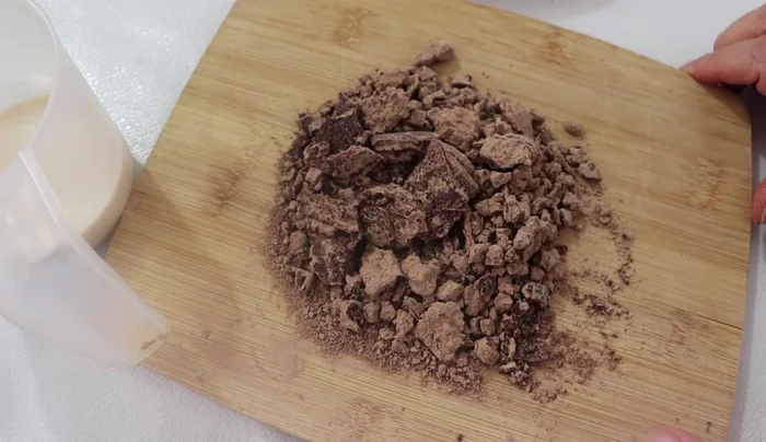 Prepare the chocolate ganache: In a microwave-safe bowl, combine whipped cream and chopped semisweet chocolate. Microwave in 45-second intervals, stirring until melted and smooth. Let cool slightly.