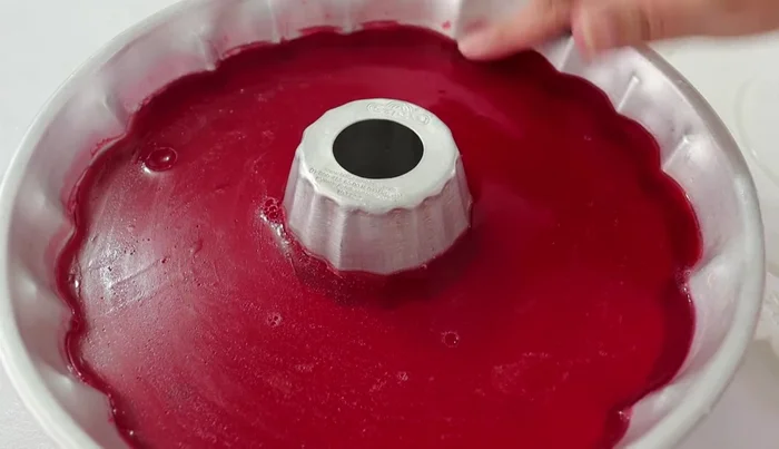 Unmold: Run a knife or spatula around the edge of the mold. Invert onto a plate with a little water to help release.