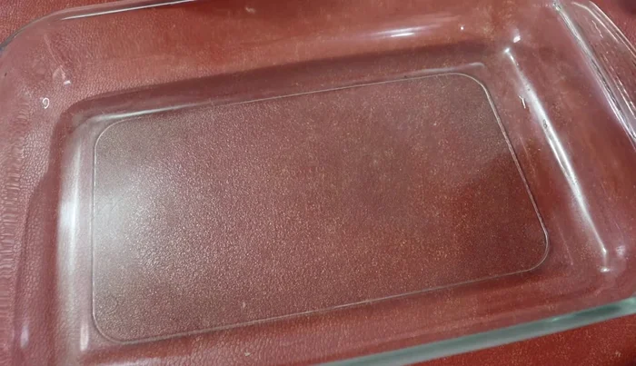 Grease a baking dish or mold with butter (281)