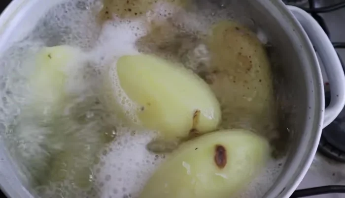 Boil potatoes until soft. Check with a fork (33.04)