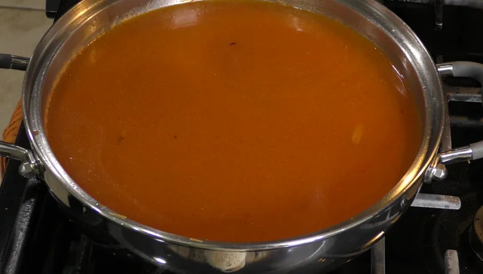 Add cilantro, chiles, and salt to taste. Simmer for 20 minutes.