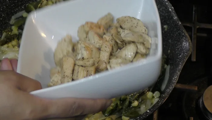 Add the cooked chicken back to the pan (429.24).