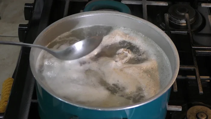 Boil chicken breasts with water. Remove foam.