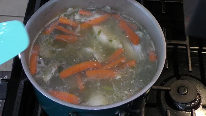 Add the rice mixture, epazote, green beans, zucchini and remaining cilantro to the chicken broth. Cook for another 10 minutes or until vegetables are tender.