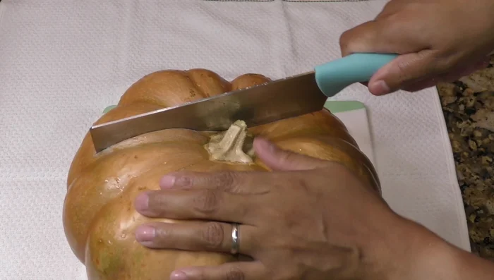 Wash the pumpkin thoroughly and cut it into small pieces. You can leave the seeds if you wish.